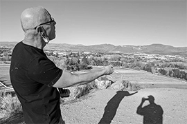 Man flying kite in a district of Reno